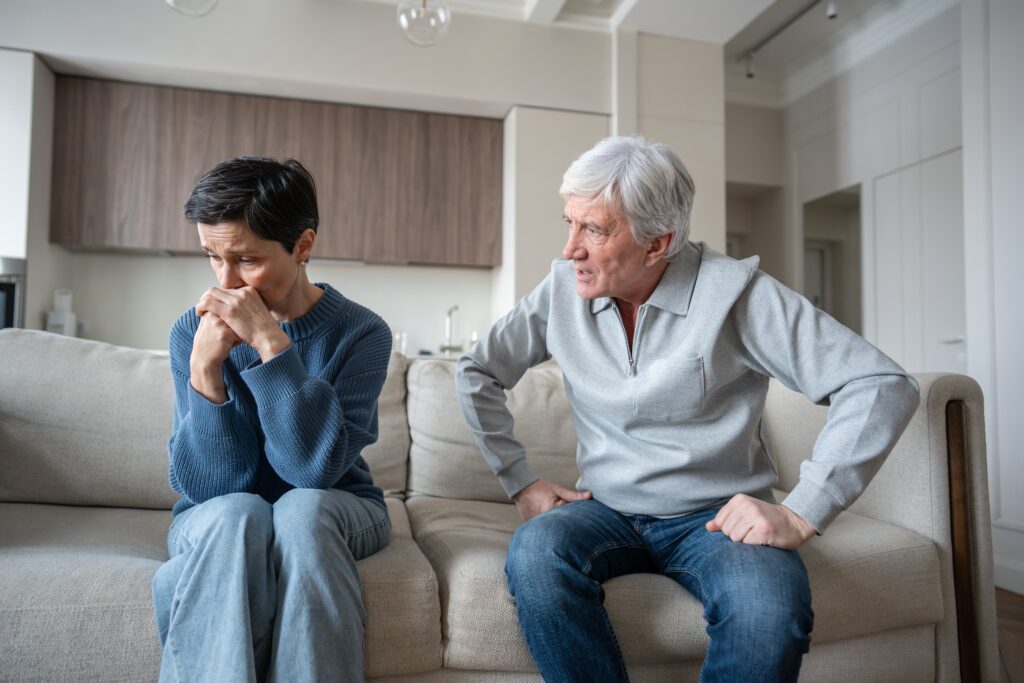 angry,hysterical,husband,with,controlling,behavior,toward,scared,wife,on